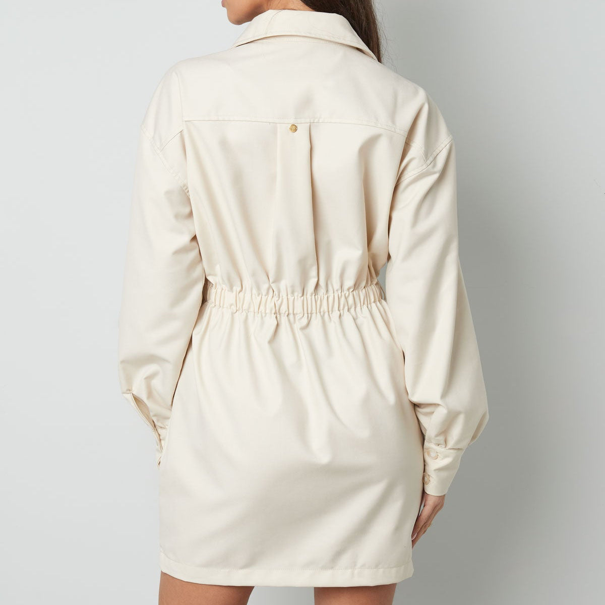 getailleerde crème jurk